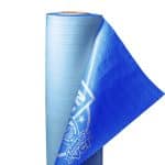 ARMOR Woven VCI woven poly corrosion‑prevention wrap shown on a vertical roll with a blue sheet partially pulled forward, highlighting durable rust‑inhibiting material for protecting metal parts and industrial equipment.