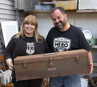 Frank Fritz and woman holding rusted chest